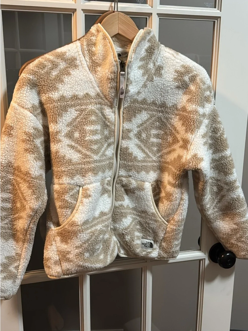 North face girls excellent used condition beige printed zip up fleece size large